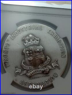 1910 Toronto Canada Industrial Expo ellis NGC Nominal Medal Ms 64