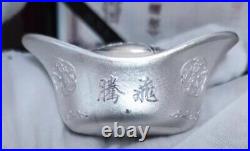 China 100 Grams (100g) Shoe-shaped Dragon Solid Silver Ingot